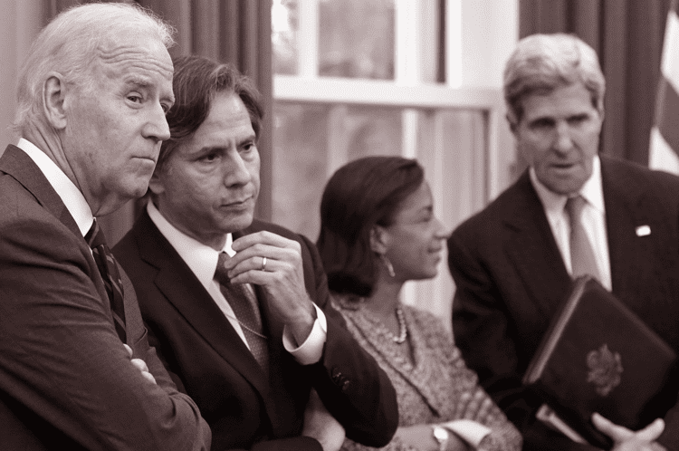President Joe Biden standing with US Special Presidential Envoy for Climate John Kerry