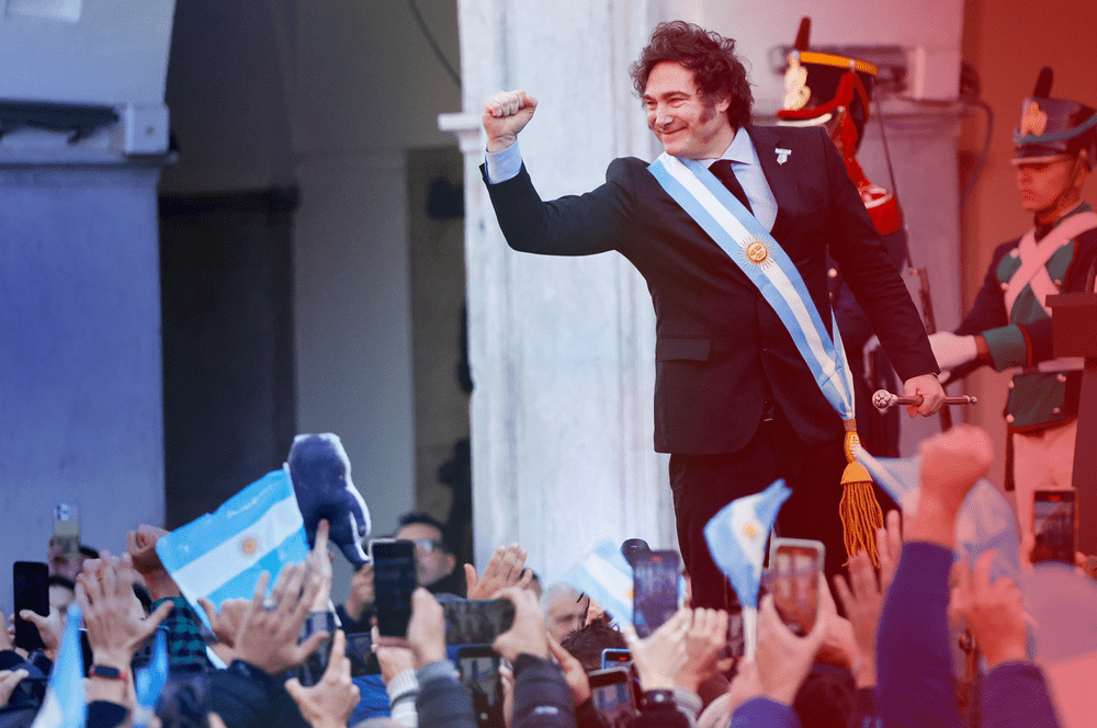 Argentina's President Javier Milei gestures to supporters outside the Cabildo during the commemoration of the 214th anniversary of the May Revolution, in Cordoba, Argentina May 25, 2024.