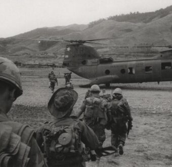 Marines boarding a transport helicopter during the Vietnam War.