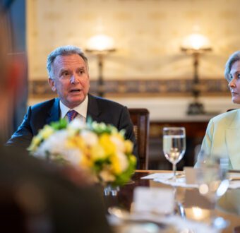 Trump adviser Steve Witkoff and Chief of Staff Susie Wiles sit at a table.
