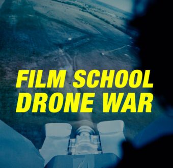 A man watches footage of a drone.