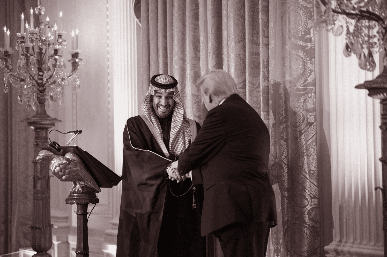 Saudi Crown Prince Mohammed bin Salman Al Saud (MBS) shakes hands with President Trump.