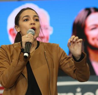 Alexandria Ocasio-Cortez speaks at a 2019 rally for Bernie Sanders.